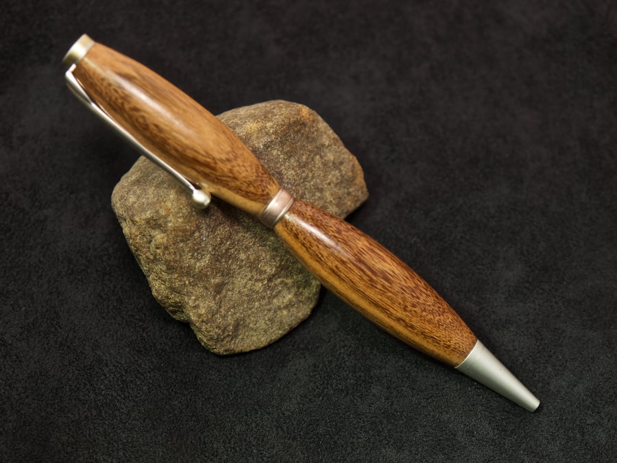 Hand made yew wood twist-pen. R5,2