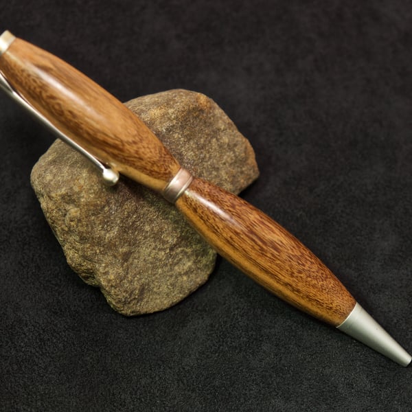 Hand made yew wood twist-pen. R5,2