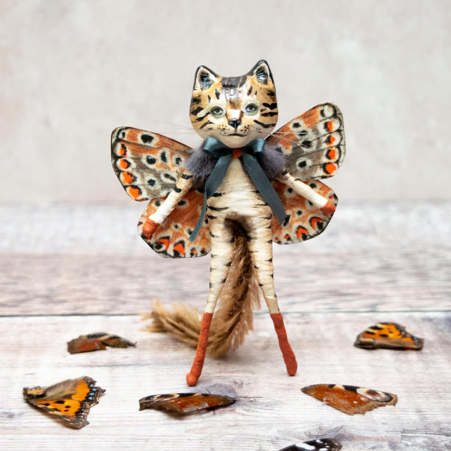 Miniature cat figurine. Quincy the cat butterfly, a luxury art doll