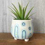 Ceramic hand thrown pot with feet