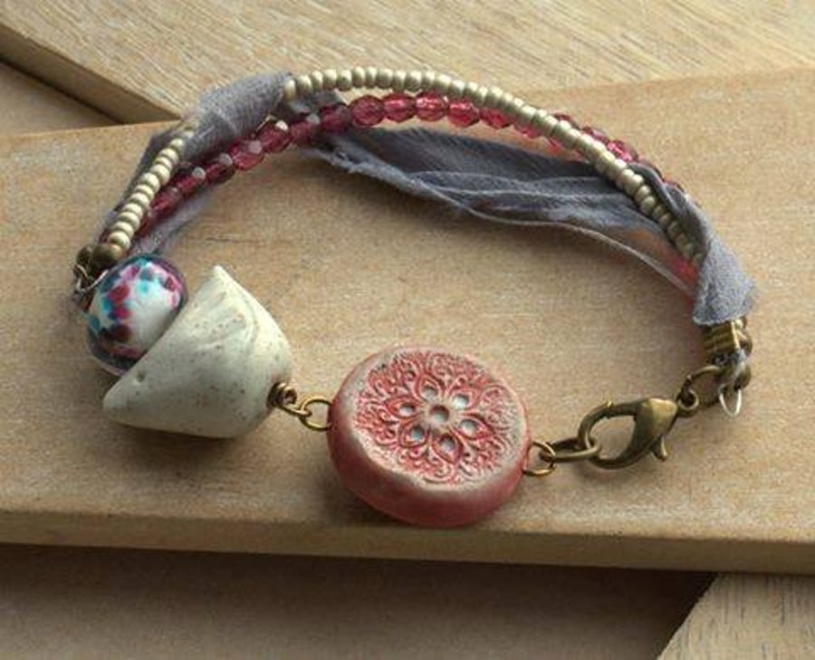Bracelet with Ceramic Bird, Clay Connector, Ribbon, Lampwork and Czech Beads
