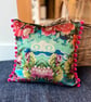 Torcello velvet cushion with bright pink pompoms colourful home