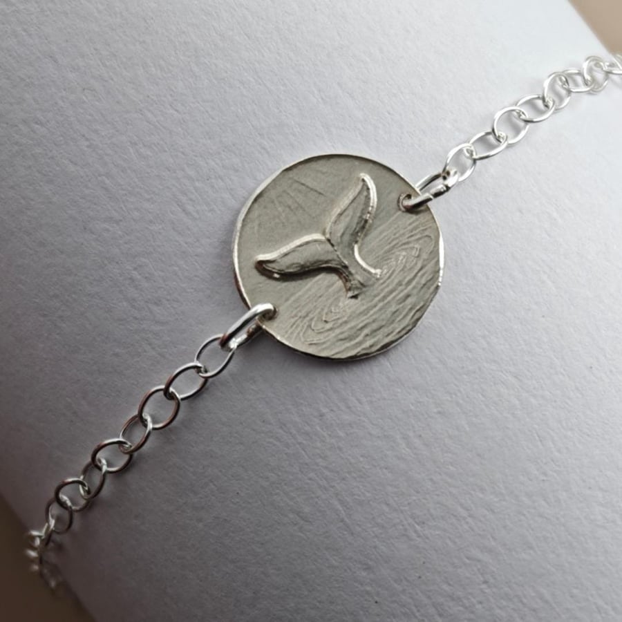 Image of Whale Tail Engraved Sterling Silver Coin Bracelet