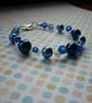 SHADES OF BLUE AND CRYSTAL BRACELET. - Image 1