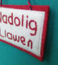 Nadolig Llawen Christmas decoration hand embroidered felt in red and white  - Image 4