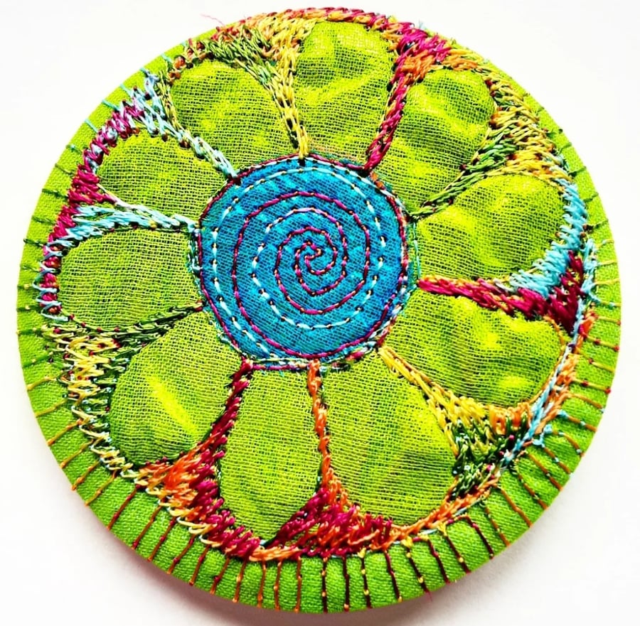58mm Fabric Badge with Free Machine Embroidery Blue and Green Flower 