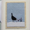 Hand-stitched card for Christmas with blackbird and berries