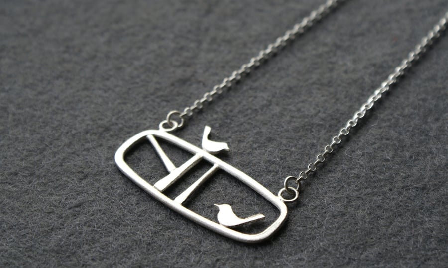 Edge of the woods silver landscape bird necklace