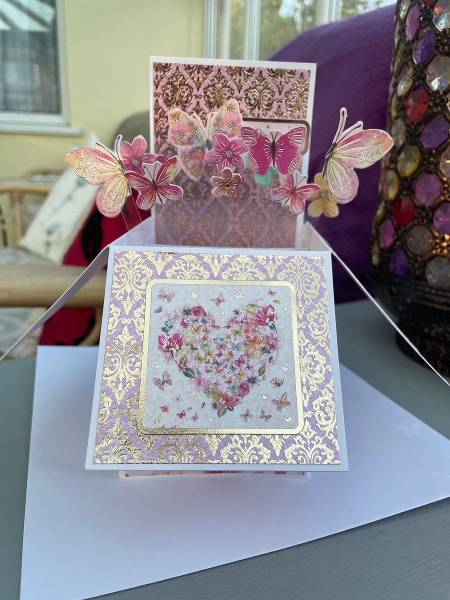 A kaleidoscope of butterflies pop up luxury birthday card