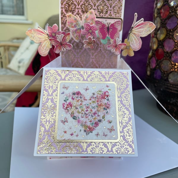 A kaleidoscope of butterflies pop up luxury birthday card