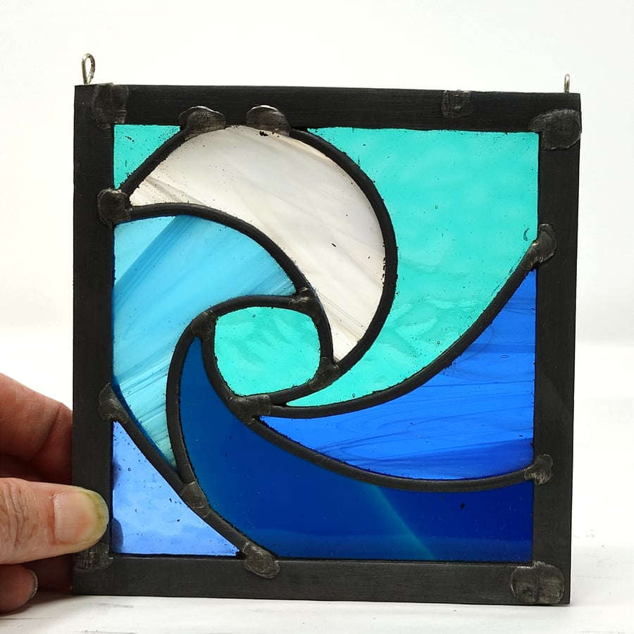 SOLD Stained glass breaking wave leaded hanging panel.