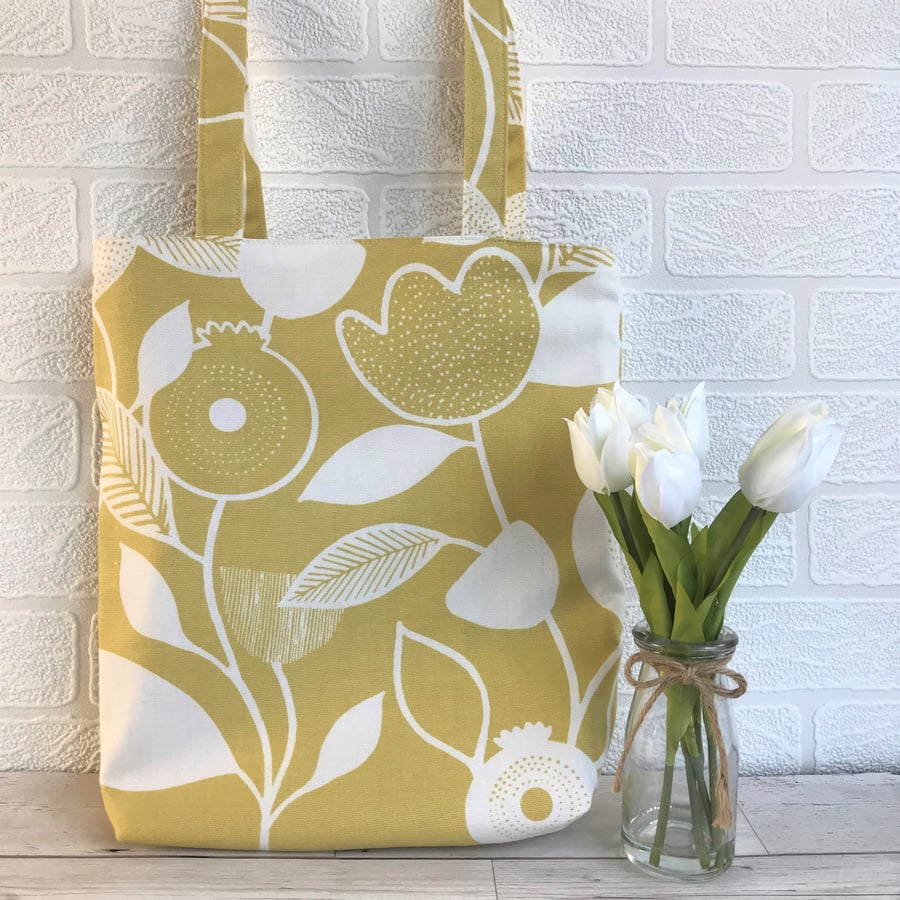 Tote bag in mustard and white stylised floral and foliage print fabric