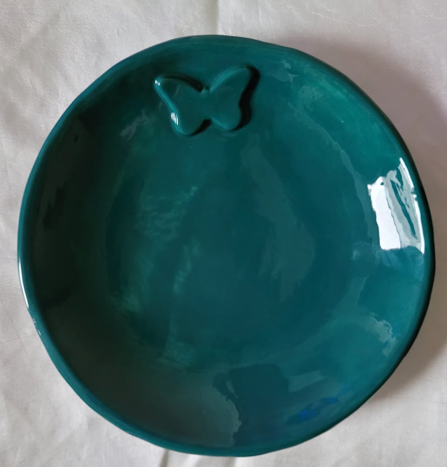 Sea green dish with butterfly