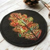 Oak leaf embroidered felt coaster. 