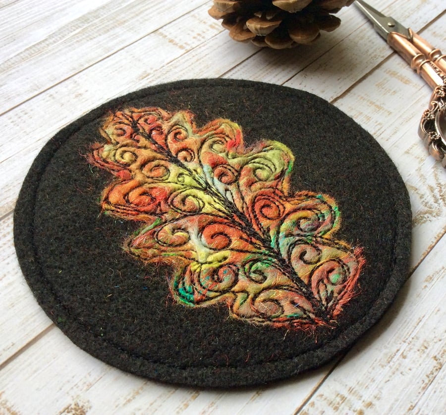 Oak leaf embroidered felt coaster. 