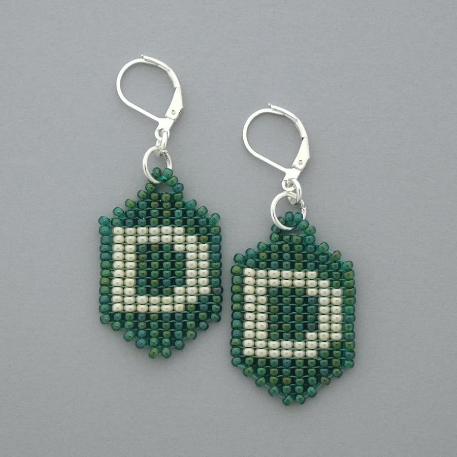 Letter D glass beaded earrings with silver plated leverback hinged ear wires. 