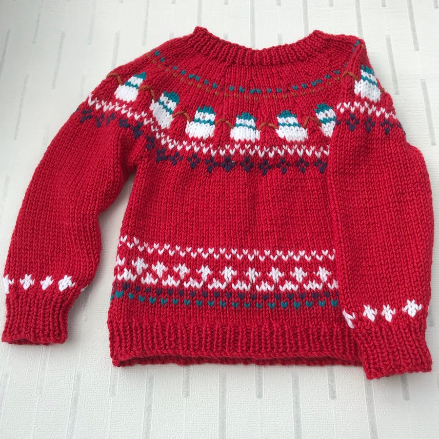 Baby's festive jumper with snowmen