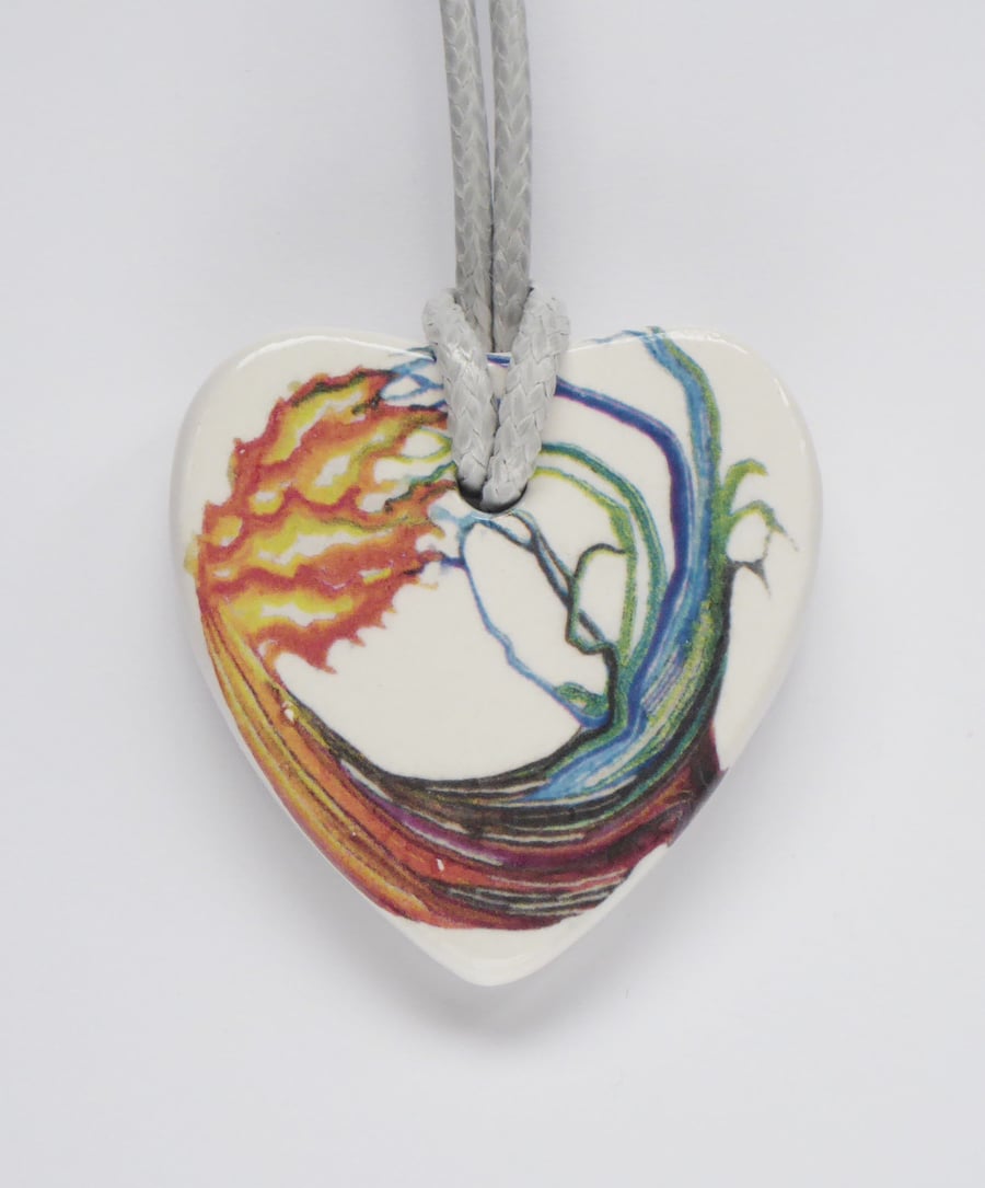 Fire and Water Elements Design on Heart Shaped Ceramic Pendant on Grey Cord