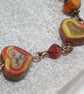 Rustic heart bracelet in red and dark yellow tones - Image 2