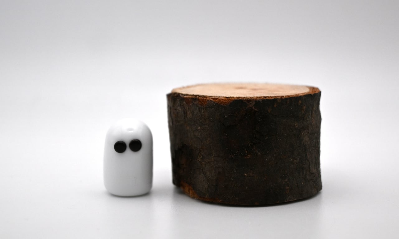 small glass ghost figure