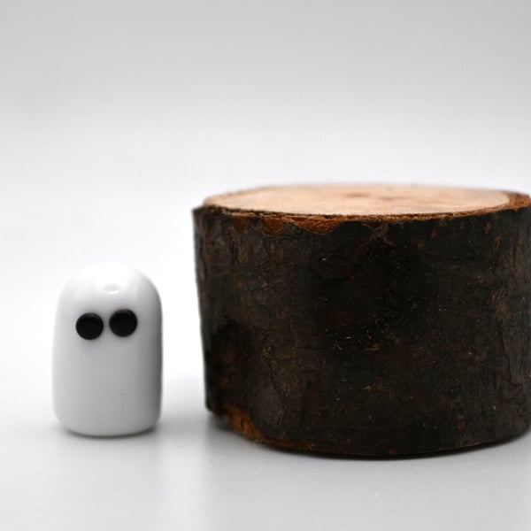 small glass ghost figure
