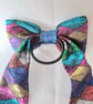 Harlequin pattern hair bow - Image 4