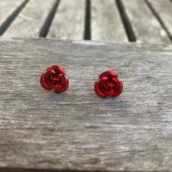 Red metal rose stud earrings