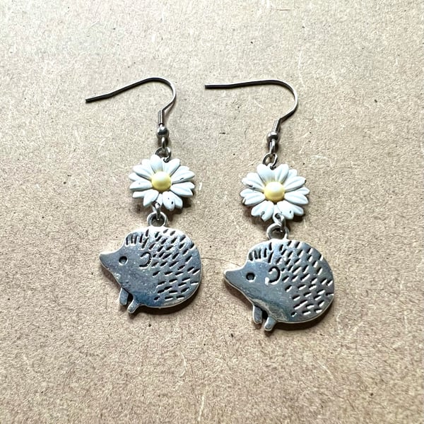 Daisy and hedgehog earrings a donation is made to Rachel’s hedgehog hotel