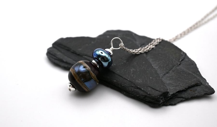 dark red and silver wrapped glass pendant necklace