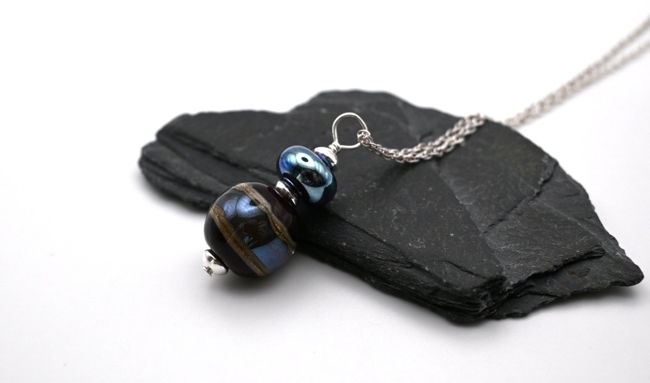 dark red and silver wrapped glass pendant necklace