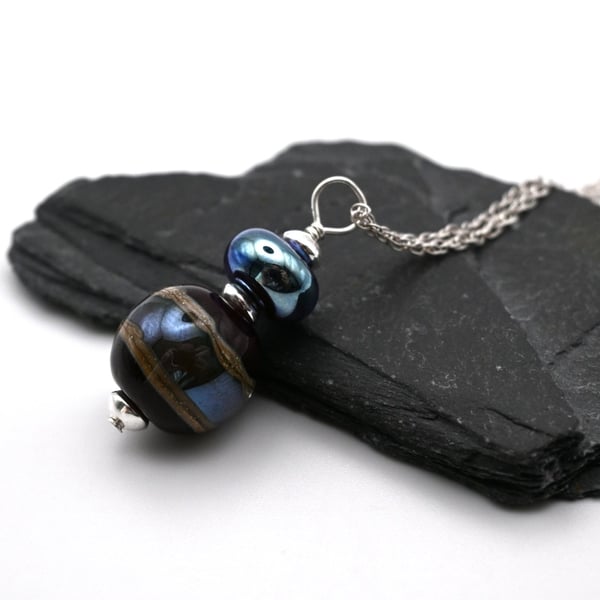 dark red and silver wrapped glass pendant necklace
