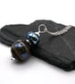 dark red and silver wrapped glass pendant necklace