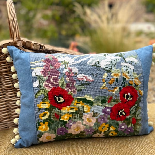 Colourful flowers tapestry cushion cover with repurposed blue canvas and pompoms