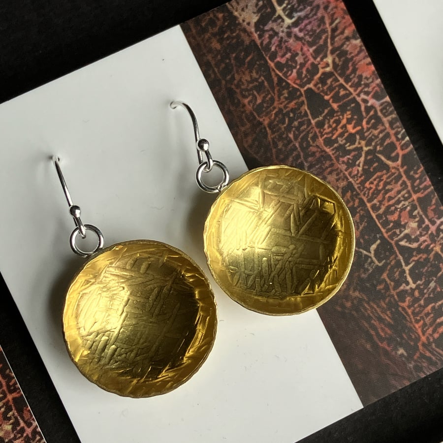 Brass bowl dangle earrings with sterling silver hooks.