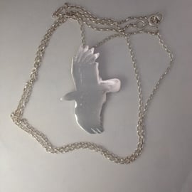 Flying crow pendant