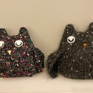 Knitted sleepy black owl ornament with  metallic  bobbles