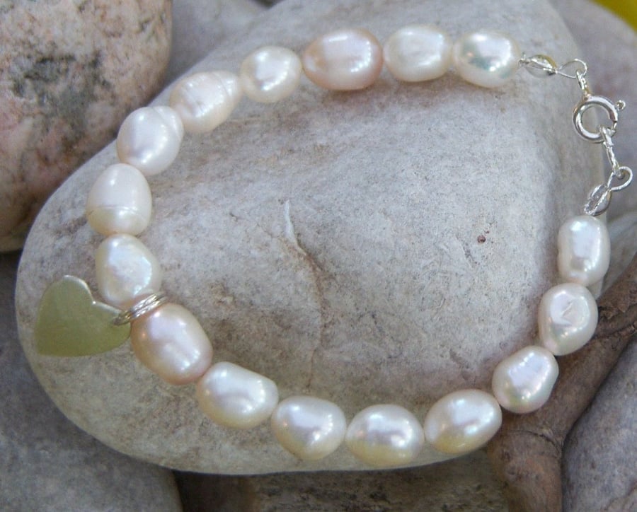 Pearl bracelet with sterling silver heart - child size