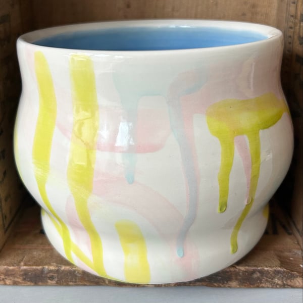 Ceramic hand thrown pot with pastel splash pattern