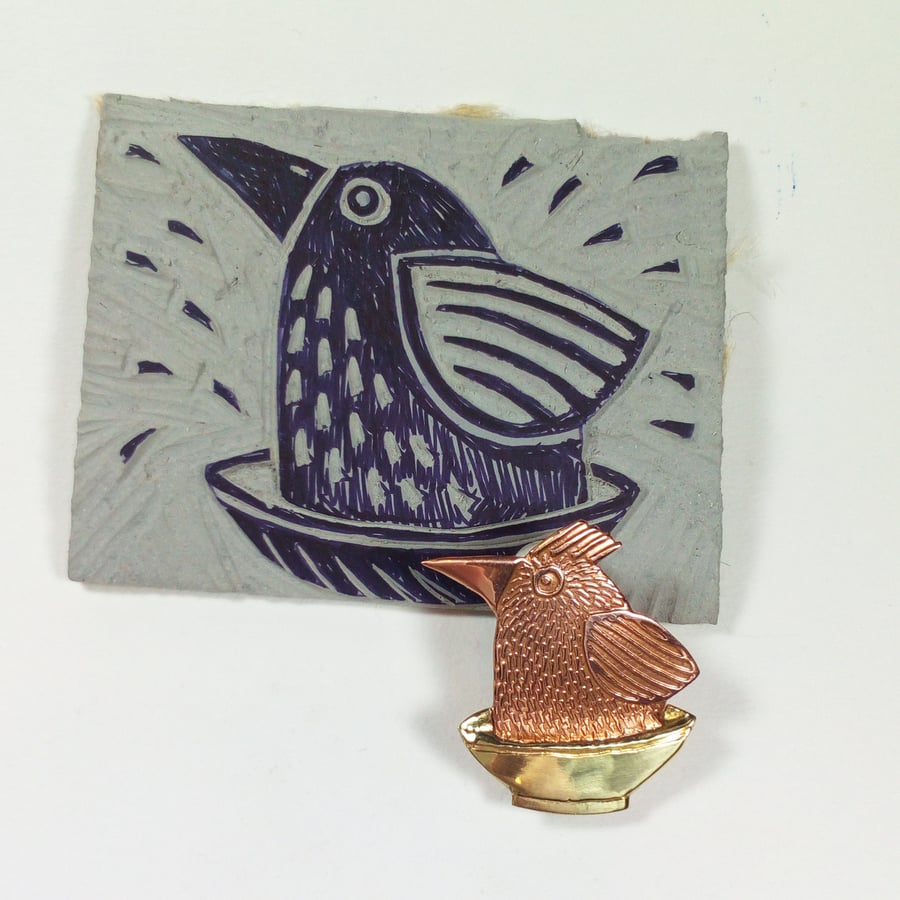  bird brooch, bird bathing