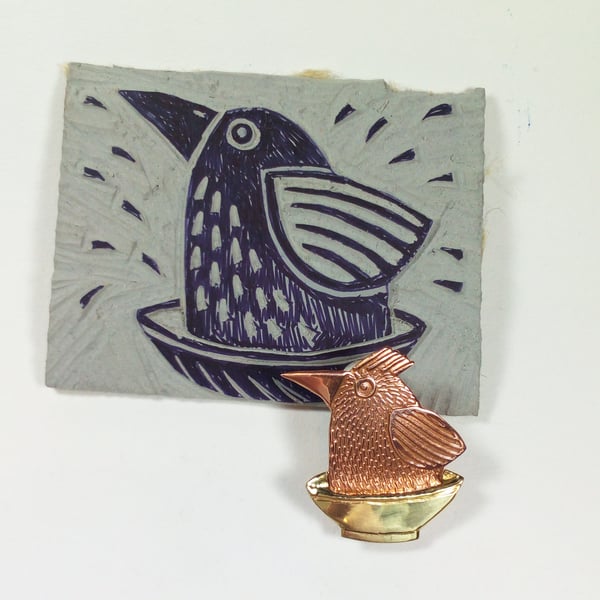  bird brooch, bird bathing