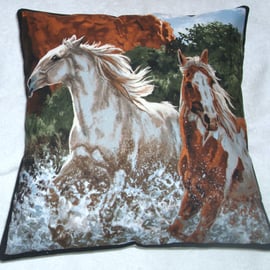  Two Wild horses galloping through a  river cushion