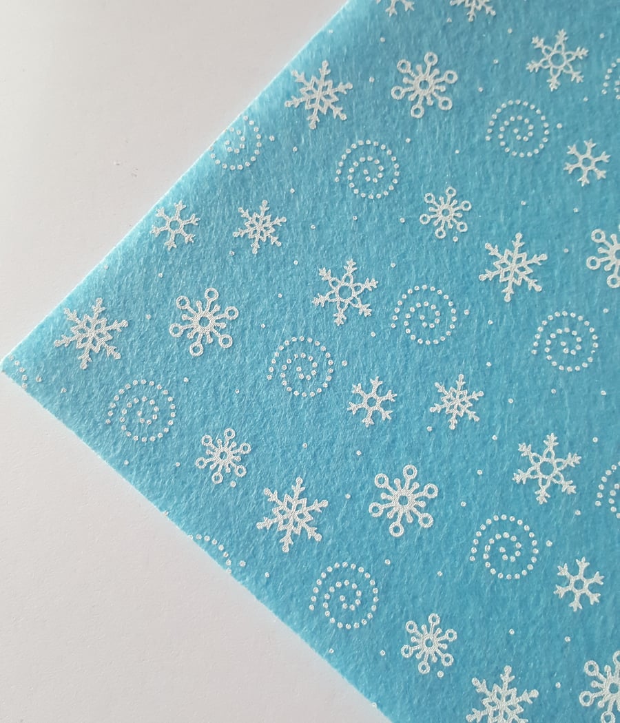 1 x Printed Felt Square - 12" x 12" - Snowflakes & Swirls - Bright Blue 