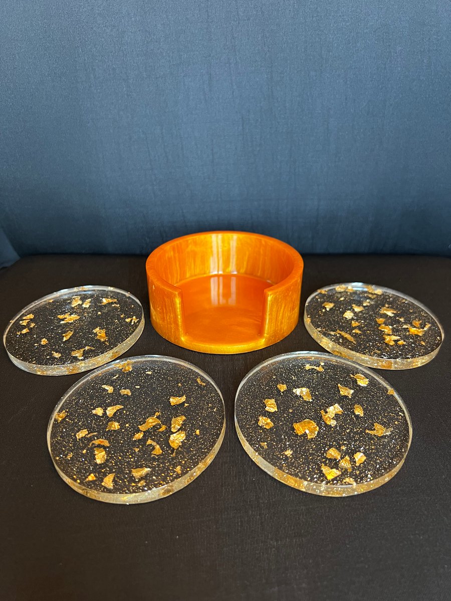 Gold set of 4 coasters with holder.