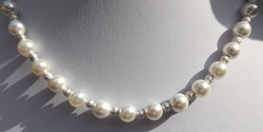16" white shell pearl necklace with stardust silver spacers