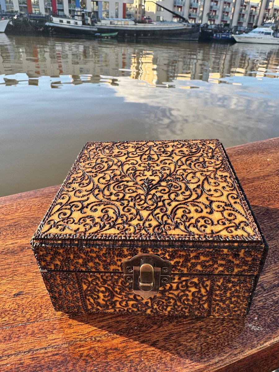Cute wooden box, intricate design inside and out.Stash box, key box, unique gif