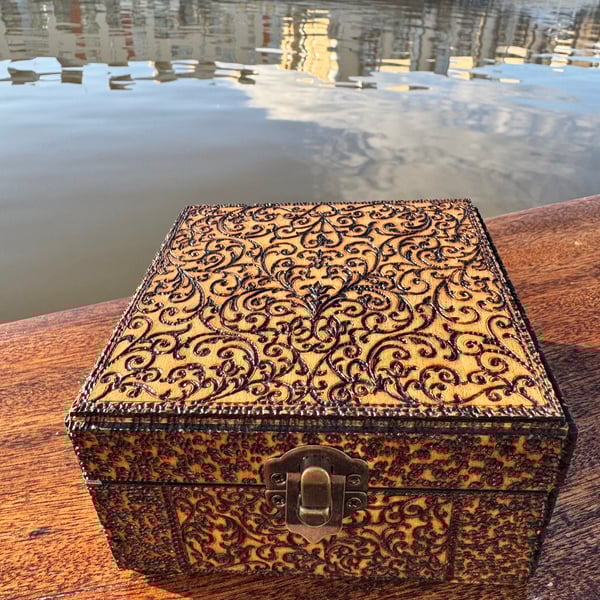 Cute wooden box, intricate design inside and out.Stash box, key box, unique gif