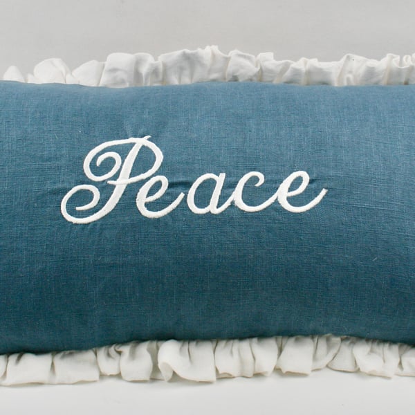 Embroidered PEACE cushion in Linen