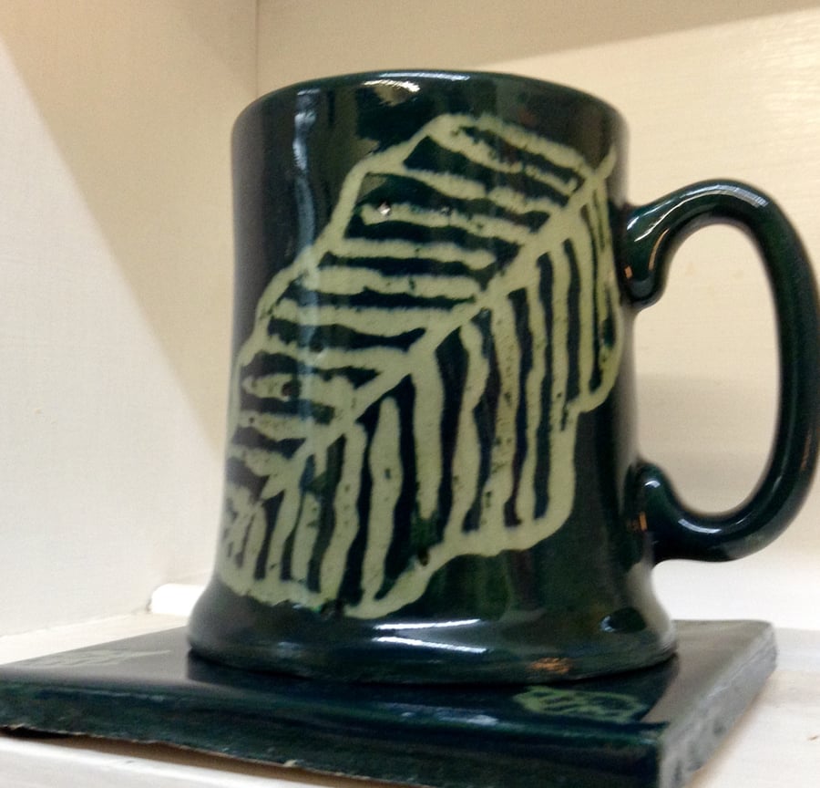 Tankard shaped mug and tile