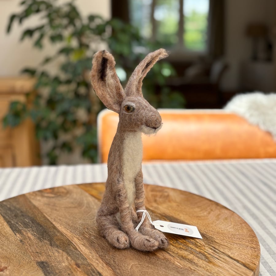 Needle felt handmade hare in a sitting position