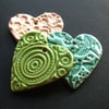 Set of three ceramic heart pendants